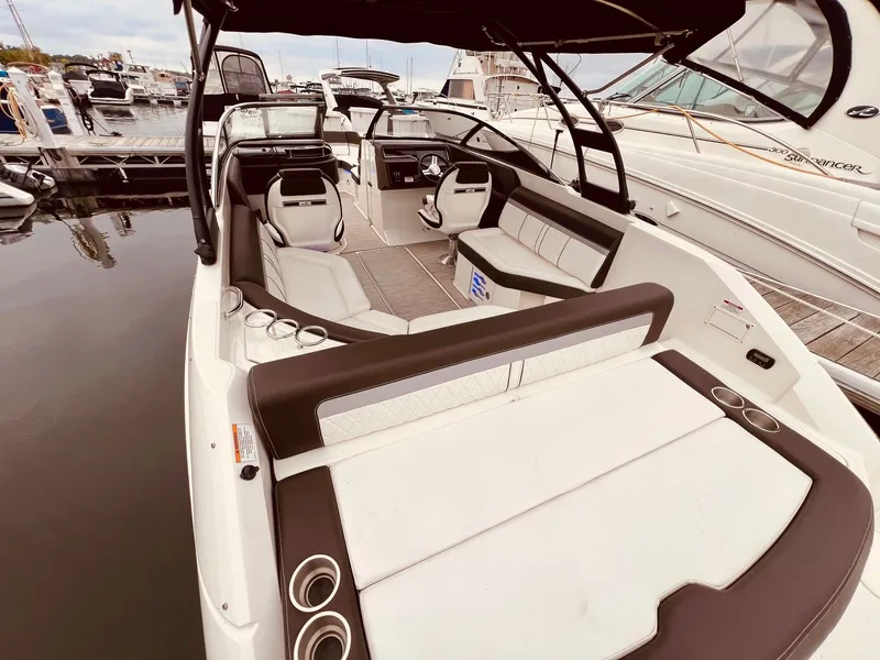 Slide: The Image of Interior view of a 2017 Sea Ray SLX 250 boat at the dock. - 5