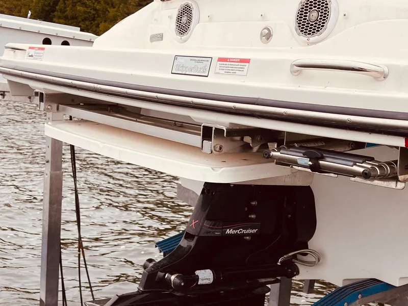 Slide: The Image of Rear view of a 2017 Sea Ray SLX 250 boat at dock. - 6