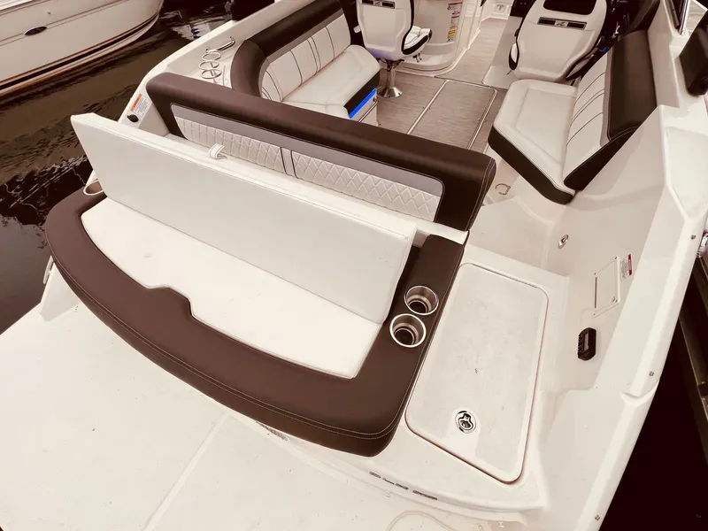 Slide: The Image of Interior of a 2017 Sea Ray SLX 250 boat with seating area. - 9