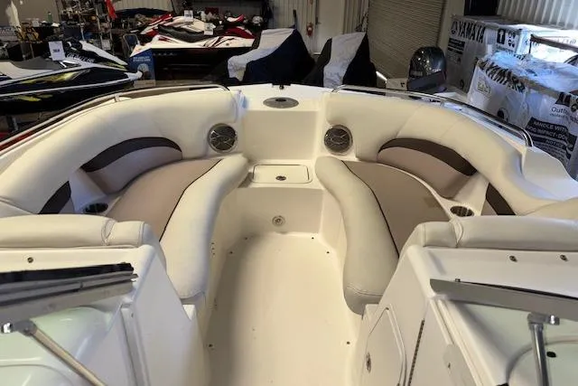 Slide: The Image of 2015 Hurricane SunDeck 2200 OB boat interior with spacious seating and modern design. - 11
