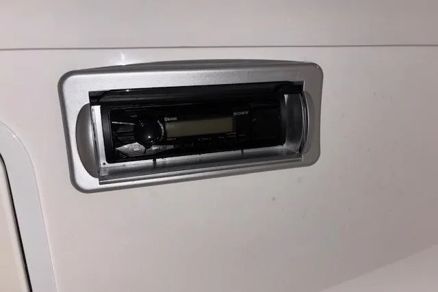 Slide: The Image of Sony stereo system on 2015 Hurricane SunDeck 2200 OB boat dashboard. - 38