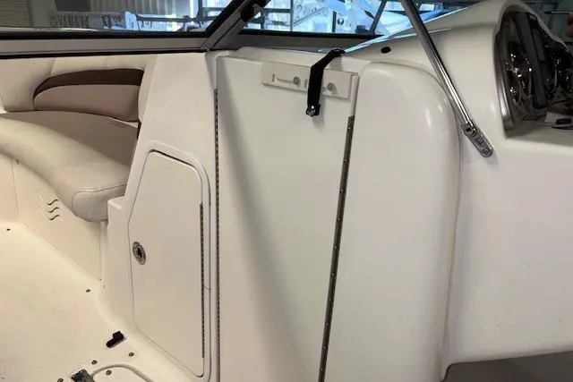 Slide: The Image of 2015 Hurricane SunDeck 2200 OB interior with seating and dashboard details. - 41