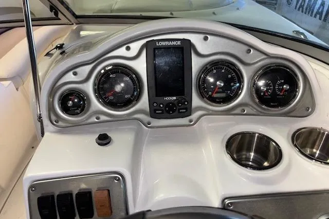 Slide: The Image of 2015 Hurricane SunDeck 2200 OB dashboard with gauges and Lowrance display. - 42