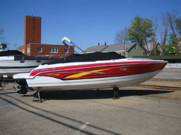 The Image of 2007 Formula 260 Sun Sport boat in a parking lot. - 0