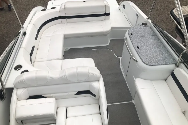 Slide: The Image of 2007 Formula 260 Sun Sport boat interior with white seating and sleek design. - 14