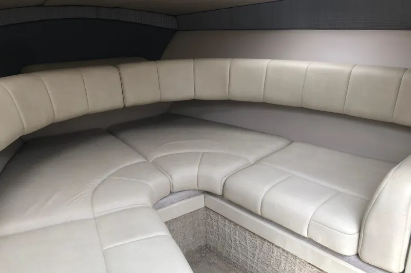 Slide: The Image of 2007 Formula 260 Sun Sport cabin interior with beige cushioned seating. - 15