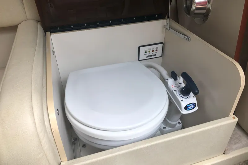 Slide: The Image of 2007 Formula 260 Sun Sport boat toilet with Jabsco manual pump system. - 18