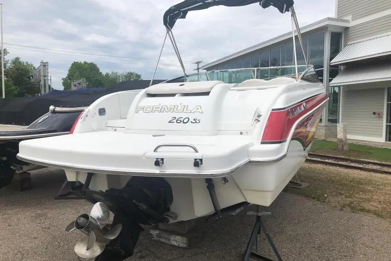Slide: The Image of 2007 Formula 260 Sun Sport boat displayed outdoors, showcasing rear view and propeller. - 6
