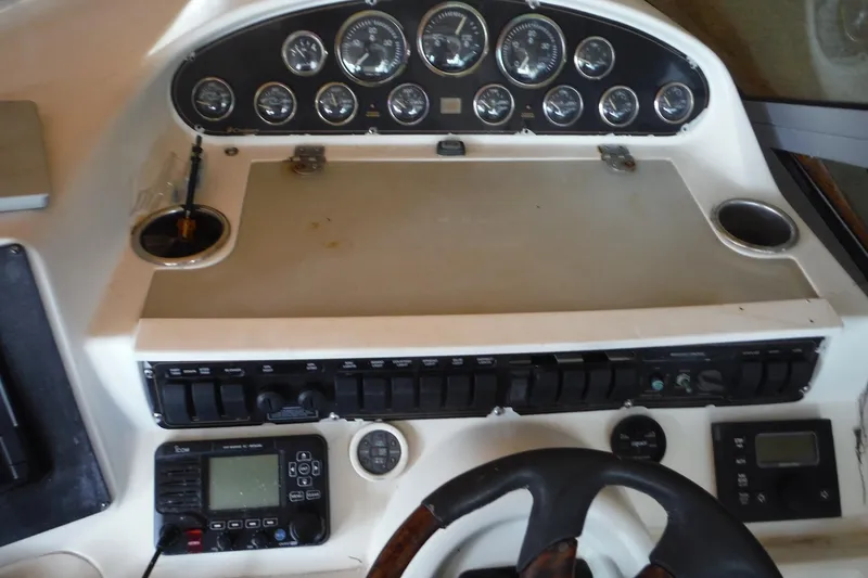 Slide: The Image of 1999 Cruisers 4270 Express dashboard with gauges, controls, and steering wheel. - 9