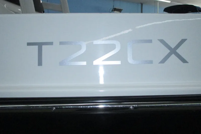 Slide: The Image of Close-up of 2022 Trophy T22CX model name on boat exterior. - 12