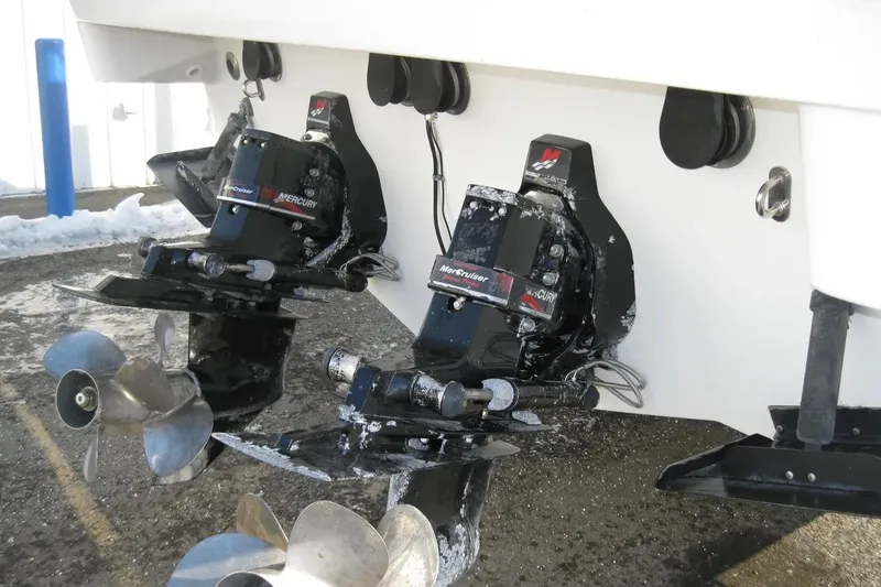 Slide: The Image of 2000 Formula 31 Performance Cruiser with dual MerCruiser outdrives in a snowy setting. - 10