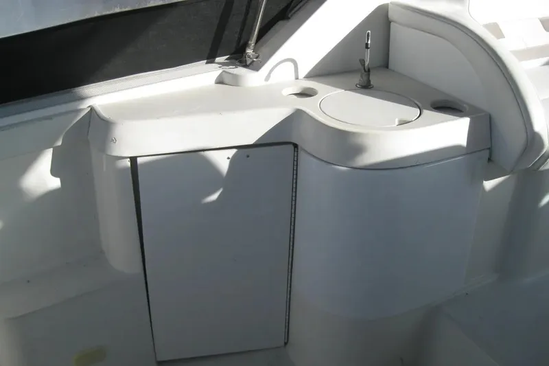 Slide: The Image of 2000 Formula 31 Performance Cruiser interior with compact sink and storage area. - 15