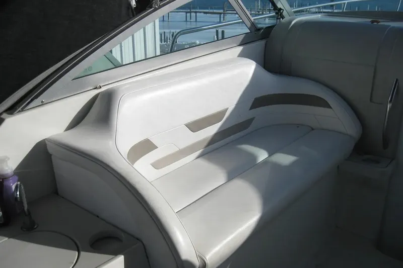 Slide: The Image of 2000 Formula 31 Performance Cruiser interior seating with white upholstery. - 16