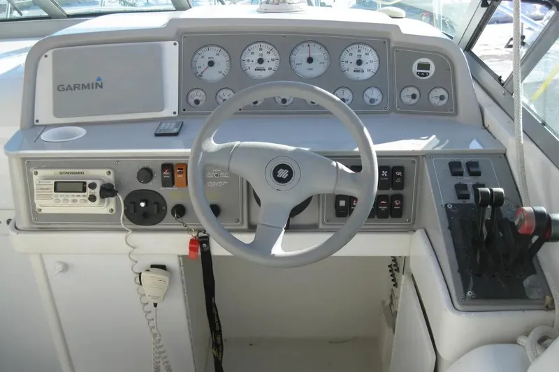 Slide: The Image of Control panel of a 2000 Formula 31 Performance Cruiser with Garmin navigation system. - 20