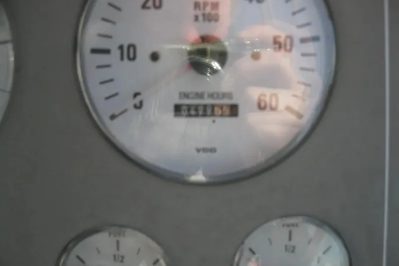 Slide: The Image of Close-up of 2000 Formula 31 Performance Cruiser engine hour gauge. - 21