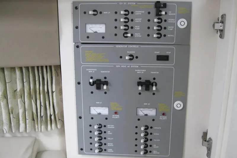 Slide: The Image of Electrical control panel on a 2000 Formula 31 Performance Cruiser boat. - 24