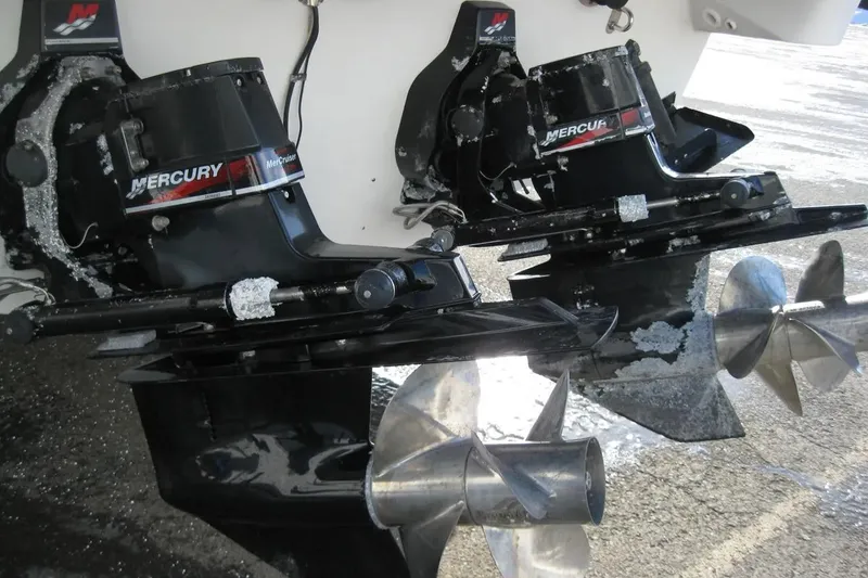 Slide: The Image of Twin Mercury MerCruiser outdrives on a 2000 Formula 31 Performance Cruiser. - 9
