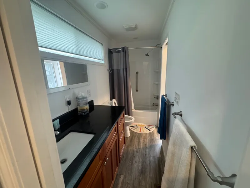 Slide: The Image of Modern bathroom in a 2019 Harbor Cottage Tiny Boat. - 36