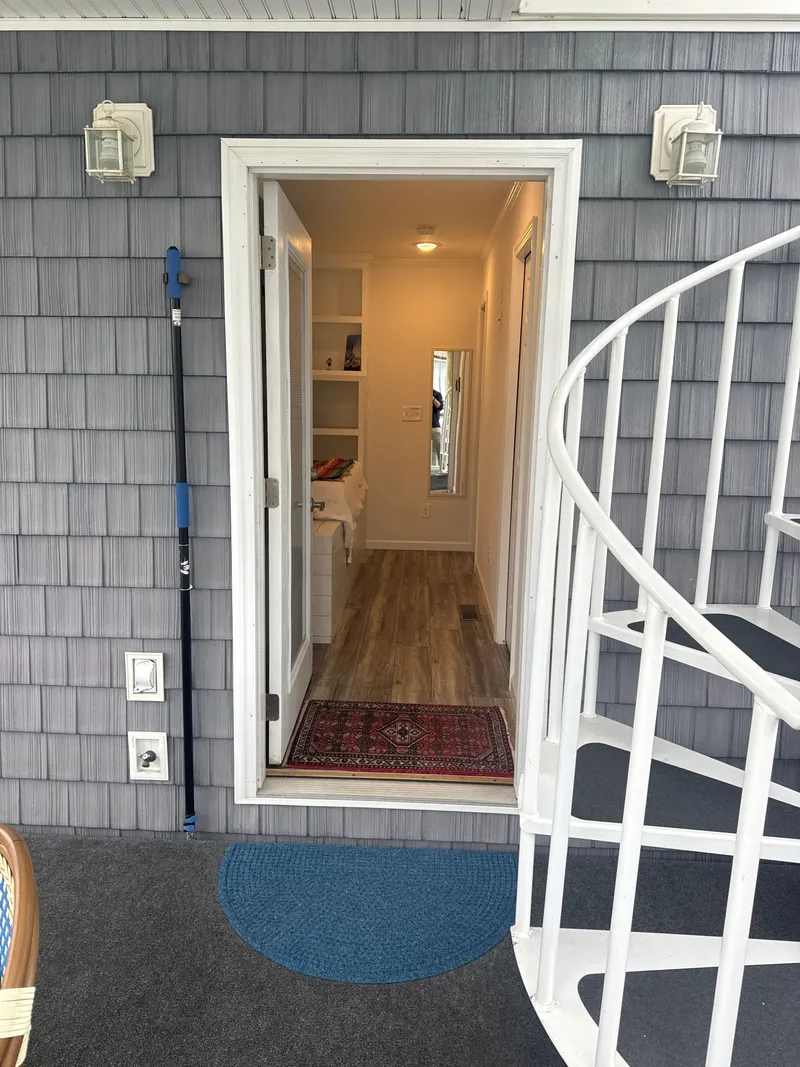 Slide: The Image of Entrance to a cozy tiny boat with spiral staircase. - 39