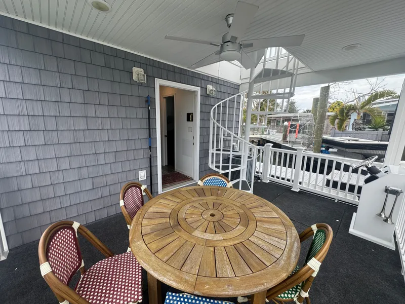 Slide: The Image of Harbor Cottage Tiny Boat with deck and spiral staircase, 2019 model. - 41