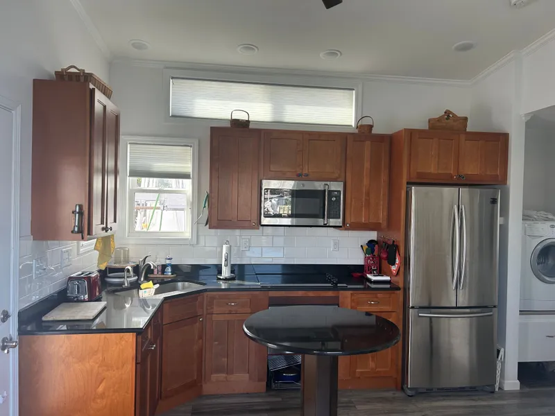 Slide: The Image of Interior view of a 2019 Harbor Cottage tiny boat. - 9