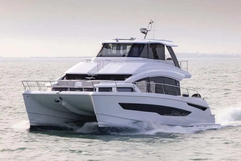 The Image of Manufacturer Provided Image: 2026 Aquila 54 Yacht cruising on open water, showcasing sleek design and modern features. - 0