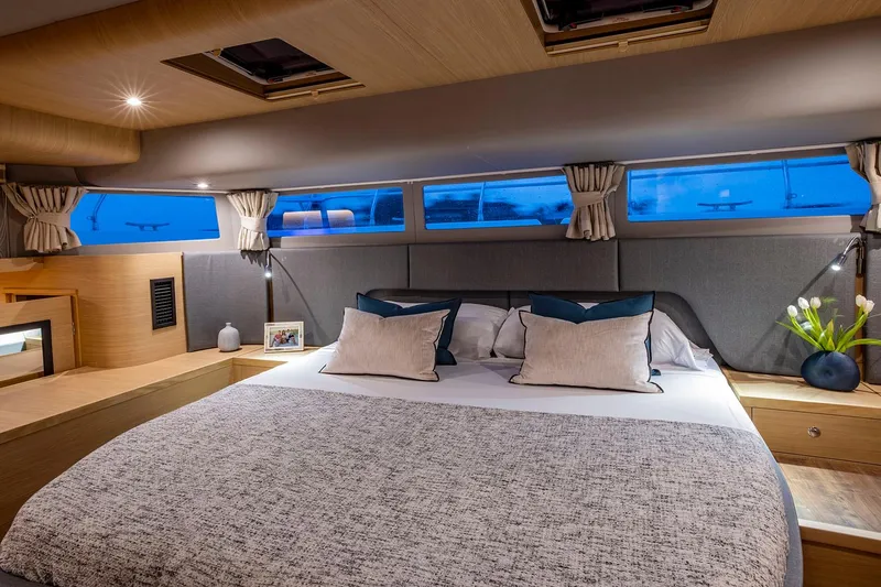 Slide: The Image of Manufacturer Provided Image: Luxurious bedroom interior of 2026 Aquila 54 Yacht with modern design and elegant decor. - 17