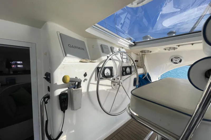 Slide: The Image of Interior view of 2010 Knysna 480 yacht, featuring cozy seating and modern amenities. - 11