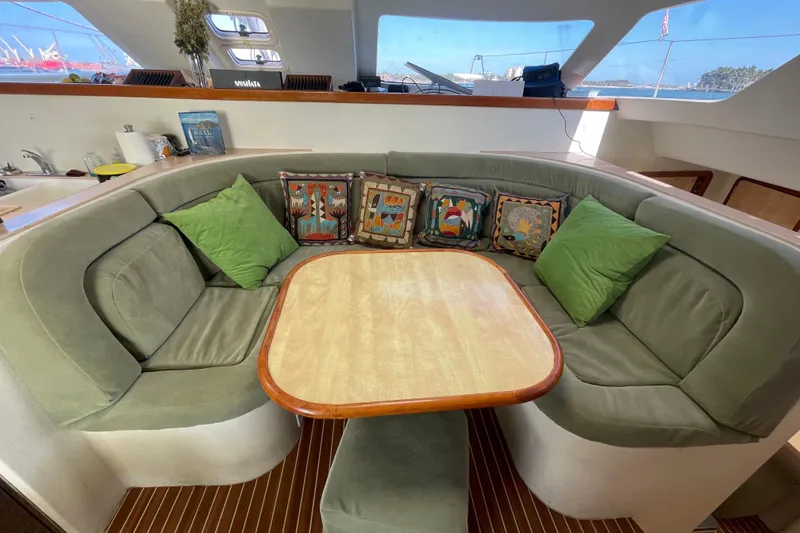 Slide: The Image of Interior of 2010 Knysna 480 yacht, featuring wooden doors and stainless steel panel. - 18