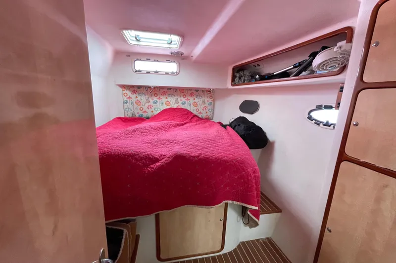 Slide: The Image of Interior of 2010 Knysna 480 yacht, featuring modern design and wooden flooring. - 32