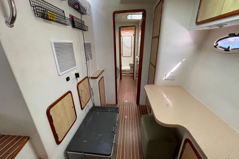Slide: The Image of Cozy cabin interior of 2010 Knysna 480 yacht with bed and storage. - 38