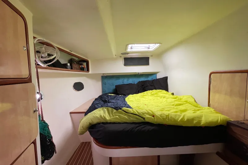 Slide: The Image of Sailboat deck with ropes and winch, Knysna 480, 2010 model, docked in harbor. - 44