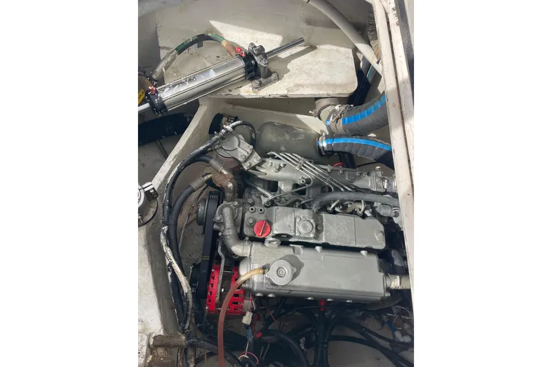 Slide: The Image of View from a 2010 Knysna 480 catamaran, showcasing solar panels and ocean backdrop. - 48