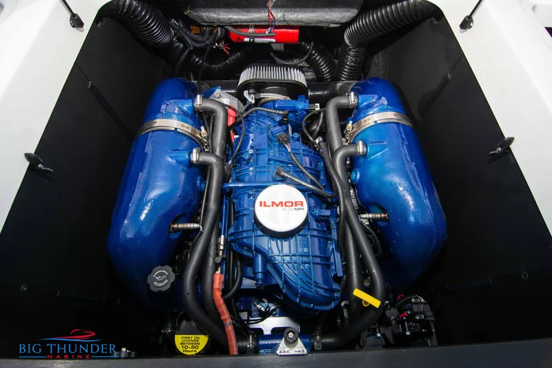 Slide: The Image of 2024 MasterCraft NXT24 Ilmor engine, blue components, detailed view. - 49