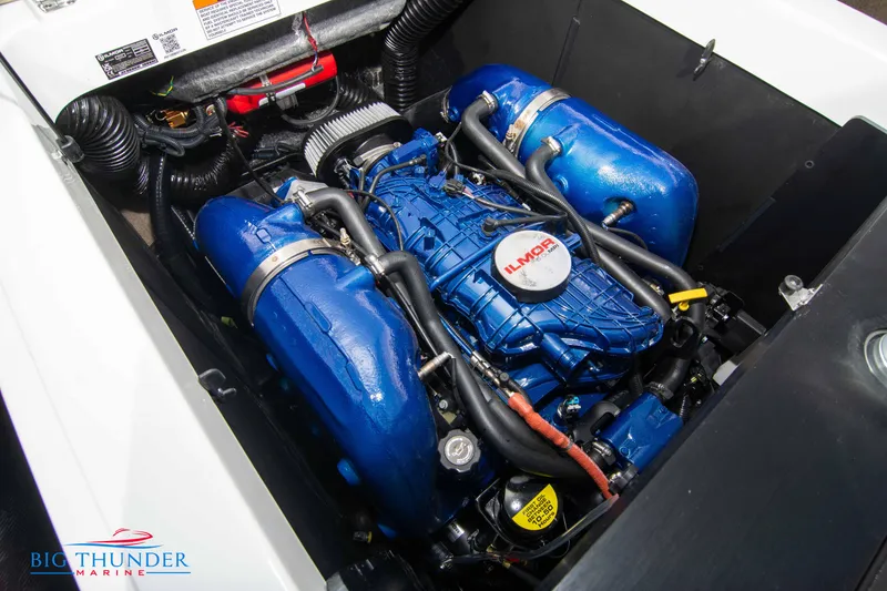 Slide: The Image of 2024 MasterCraft NXT24 engine compartment with Ilmor marine engine, showcased by Big Thunder Marine. - 50