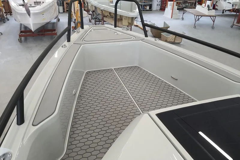 Slide: The Image of 2021 XO Boats DFNDR9 interior seats, featuring sleek design and comfortable upholstery. - 12