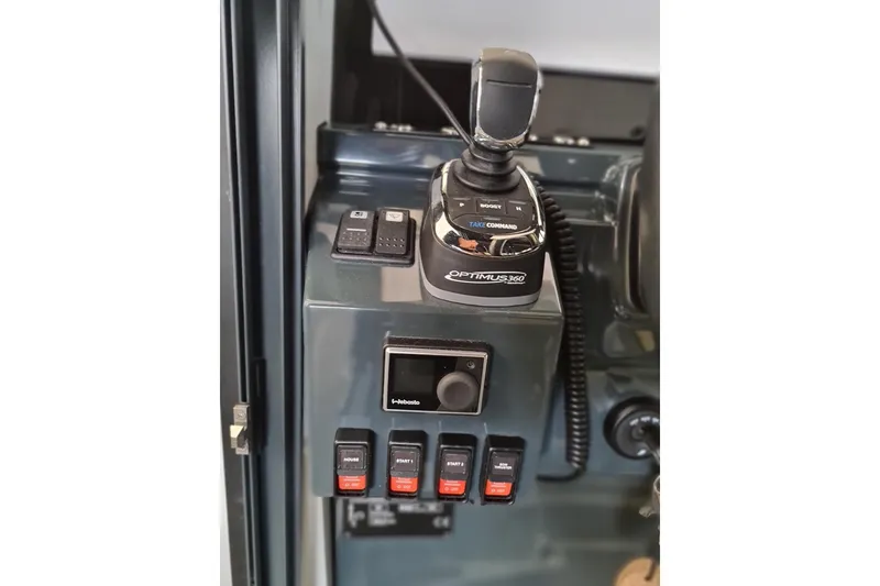 Slide: The Image of Interior of 2021 XO Boats DFNDR9, featuring cozy seating and modern design elements. - 17