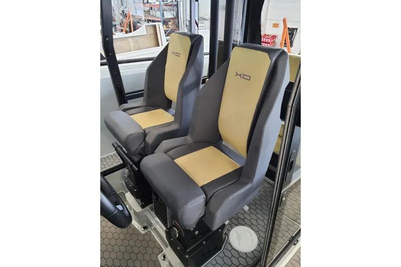 Slide: The Image of 2021 XO Boats DFNDR9 interior cabin with compact bathroom and modern design. - 22