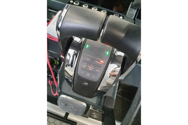 Slide: The Image of 2021 XO Boats DFNDR9 with Trailer, top view, showcasing sleek design and seating layout. - 23