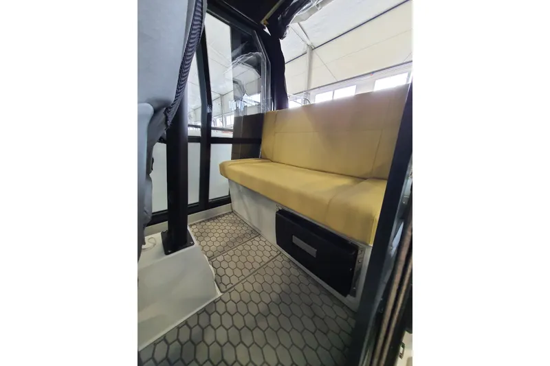 Slide: The Image of 2021 XO Boats DFNDR9 with Trailer, sleek design, side view, modern features. - 25