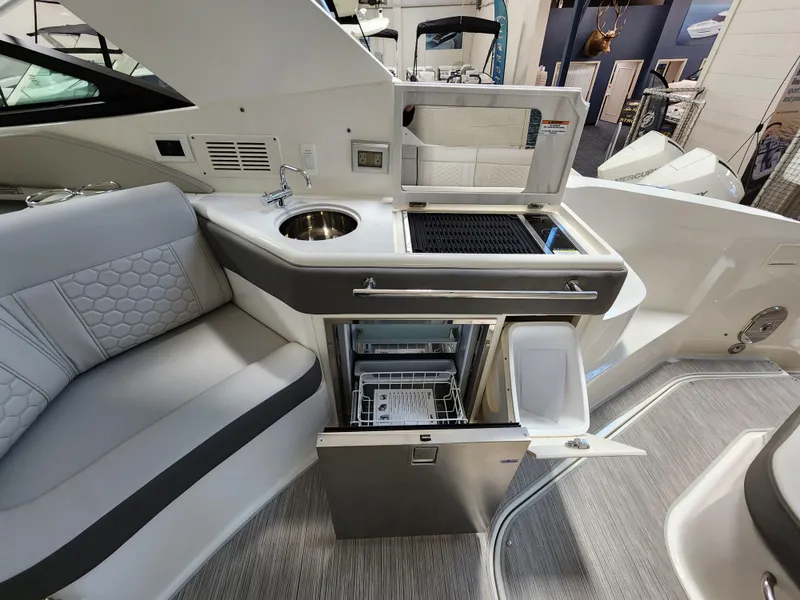 Slide: The Image of Interior of 2023 Sea Ray Sundancer 320 yacht with modern kitchenette. - 5