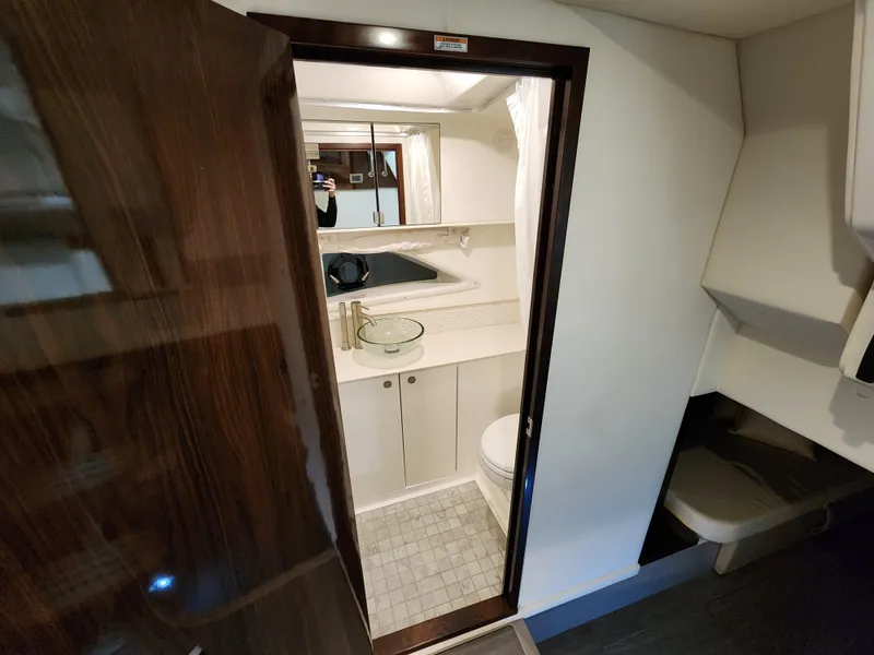 Slide: The Image of Interior of Sea Ray Sundancer 320 yacht, bathroom view, year 2023. - 9
