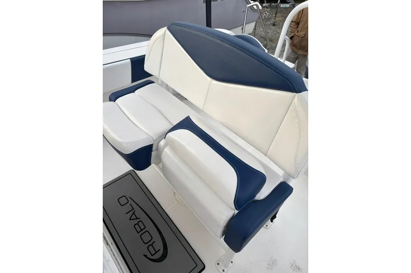 Slide: The Image of 2021 Robalo R200 Center Console boat seat with blue and white upholstery. - 11