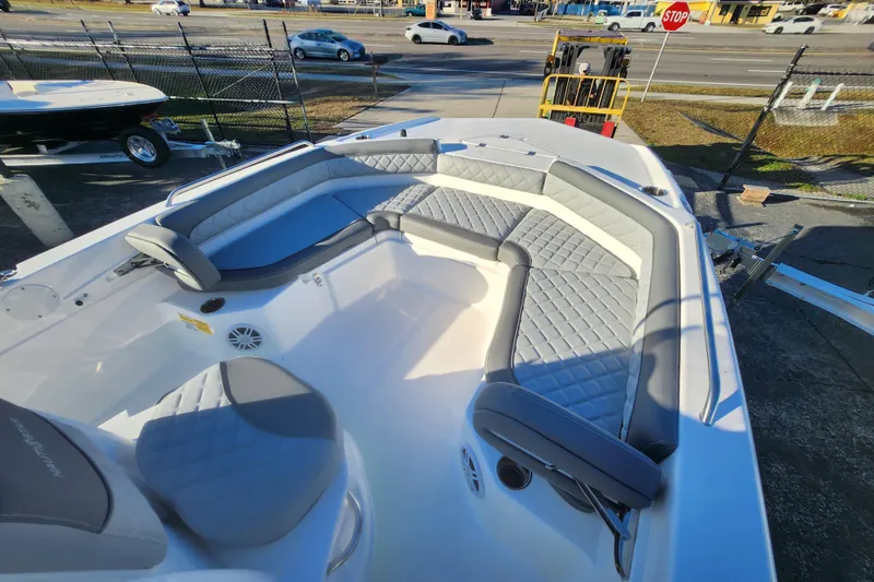 Slide: The Image of 2026 NauticStar 211 Hybrid boat with spacious seating and modern design. - 8