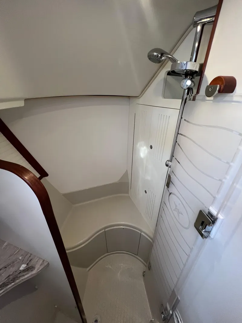 Slide: The Image of Interior view of shower on Island Packet 439 yacht, 2023 model. - 9