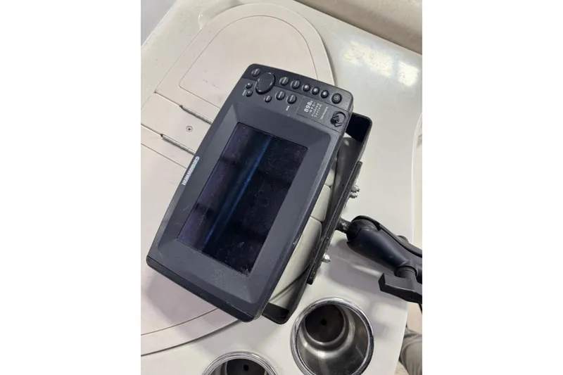 Slide: The Image of Fishfinder device on a 2009 Tahoe 215xi I/O boat dashboard. - 9