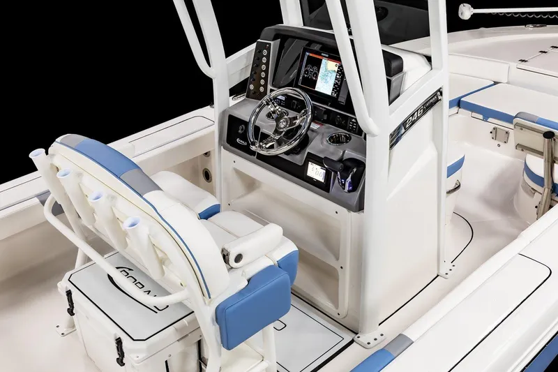 Slide: The Image of Manufacturer Provided Image: 2025 Robalo 246 Cayman boat with sleek white and blue design, top view. - 7