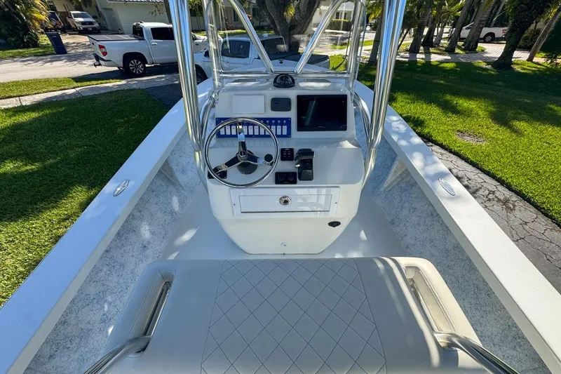 Slide: The Image of 1972 Cuda Craft Open Fisherman boat interior with steering wheel and control panel. - 17