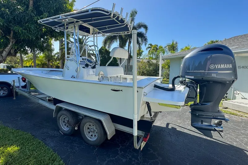 Slide: The Image of 1972 Cuda Craft Open Fisherman boat with Yamaha outboard motor on trailer. - 2