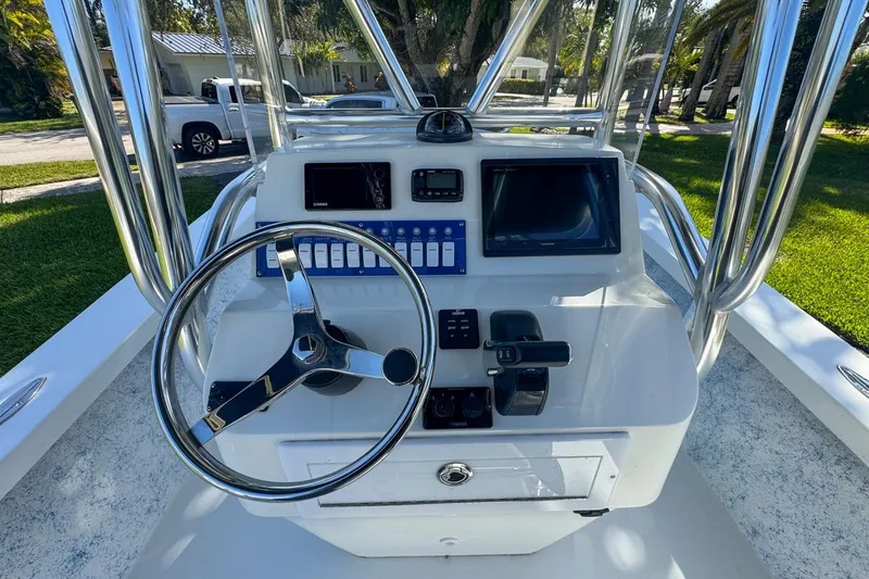 Slide: The Image of 1972 Cuda Craft Open Fisherman boat console with steering wheel and navigation controls. - 22